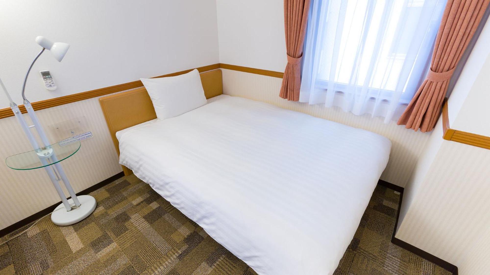 Toyoko Inn Oita Ekimae Værelse billede